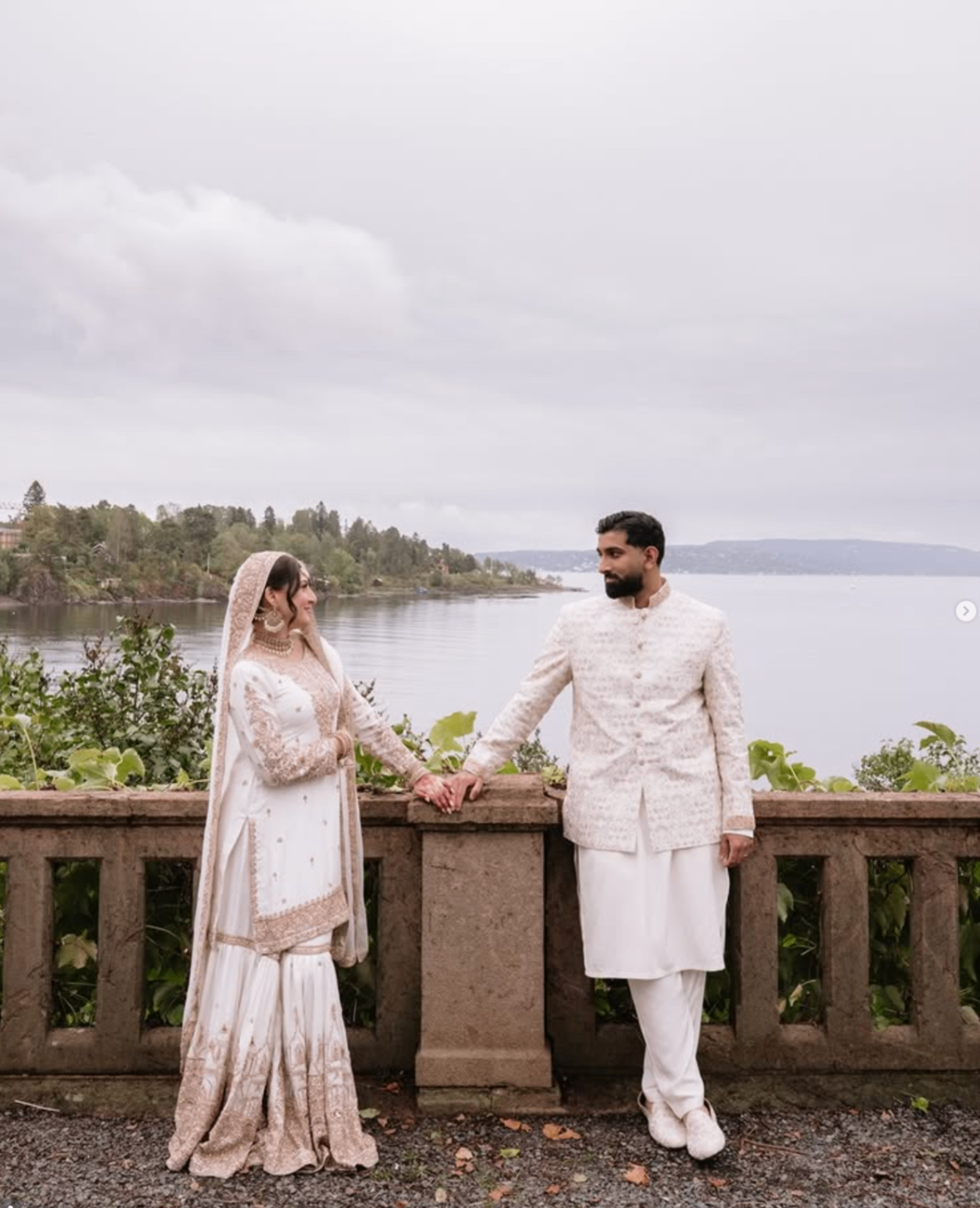Wedding portrait by the water photographed by Pamila